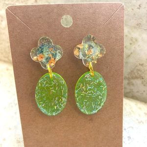 Dangling green glitter earrings